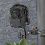 Brinno TLC2020-C time lapse camera placed in green leaves for outdoor use, with Waterproof Housing